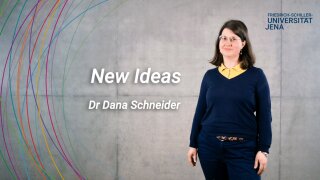 placeholder image — Dr. Dana Schneider in front of a grey wall, next to her is the keyword freedom.