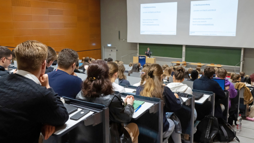 Law students attend a lecture in lecture hall 1 on the campus at Ernst-Abbe-Platz.