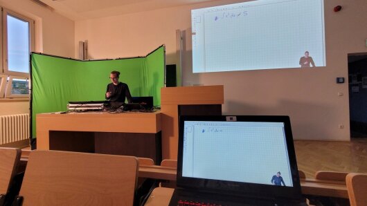 Teacher demonstrating streaming setup.