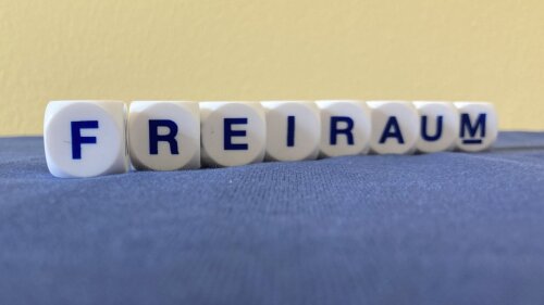 letter cubes form the word 'free space'