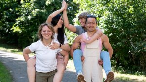 Four student form two piggy-back teams