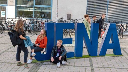 Students on the campus of the University of Jena.